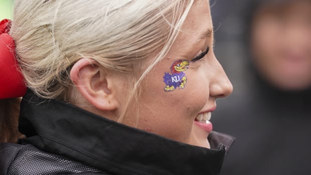 Oct 28, 2023; Lawrence, Kansas, USA; A Kansas Jayhawks fan shows support against the Oklahoma Sooners during the second half at David Booth Kansas Memorial Stadium. Mandatory Credit: Denny Medley-USA TODAY Sports  
