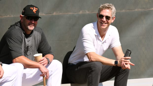 Feb 15, 2020; Sarasota, Florida, USA; Baltimore Orioles manager Brandon Hyde (18) and Baltimore Orioles general manager Mike Elias talk during the spring training workout at Ed Smith Stadium. Mandatory Credit: Jonathan Dyer-USA TODAY Sports