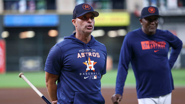 Aug 9, 2022; Houston, Texas, USA; Houston Astros bench coach Joe Espada (19) talks before the game against the Texas Rangers at Minute Maid Park. Mandatory Credit: Troy Taormina-USA TODAY Sports