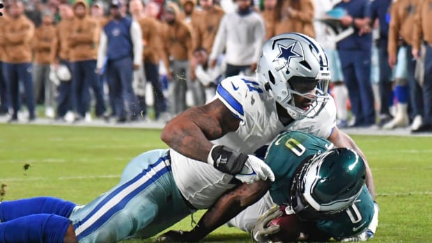 Nov 5, 2023; Philadelphia, Pennsylvania, USA; Dallas Cowboys linebacker Micah Parsons (11) stops Philadelphia Eagles running back D'Andre Swift (0) short of the goal line during the second quarter at Lincoln Financial Field.
