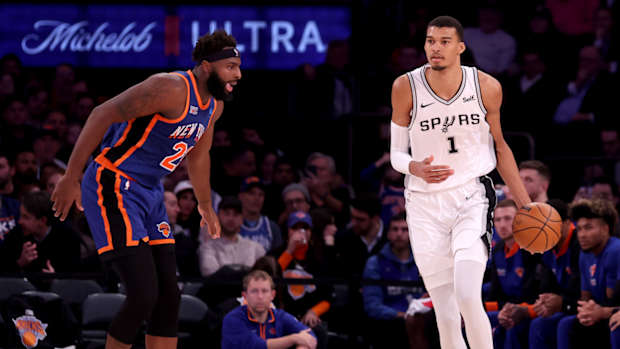 New York Knicks center Mitchell Robinson and San Antonio Spurs rookie Victor Wembanyama.