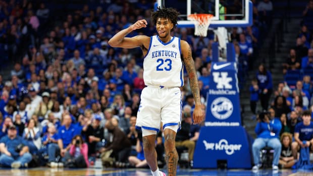 Nov 6, 2023; Lexington, Kentucky, USA; Kentucky Wildcats guard Jordan Burks (23) celebrates during the second half against the New Mexico State Aggies at Rupp Arena at Central Bank Center. Mandatory Credit: Jordan Prather-USA TODAY Sports
