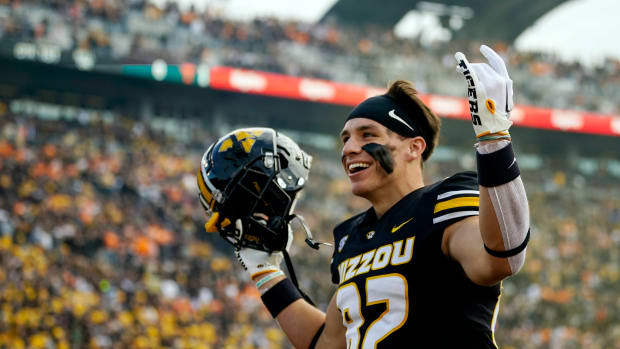 Missouri Tigers wide receiver Logan Muckey (82) take the field prior to a game against the Tennessee Volunteers at Faurot Field at Memorial Stadium.