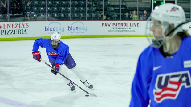 Britta Curl (17) moves the puck as she practices with Team USA at Mullett Arena in Tempe on Nov. 6, 2023.