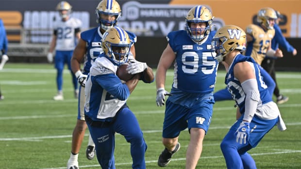 Nov 16, 2023; Hamilton, Ontario, CAN; Winnipeg Blue Bombers running back Johnny Augustine (27) runs with the ball during practice at Tim Hortons Field. Mandatory Credit: Dan Hamilton-USA TODAY Sports