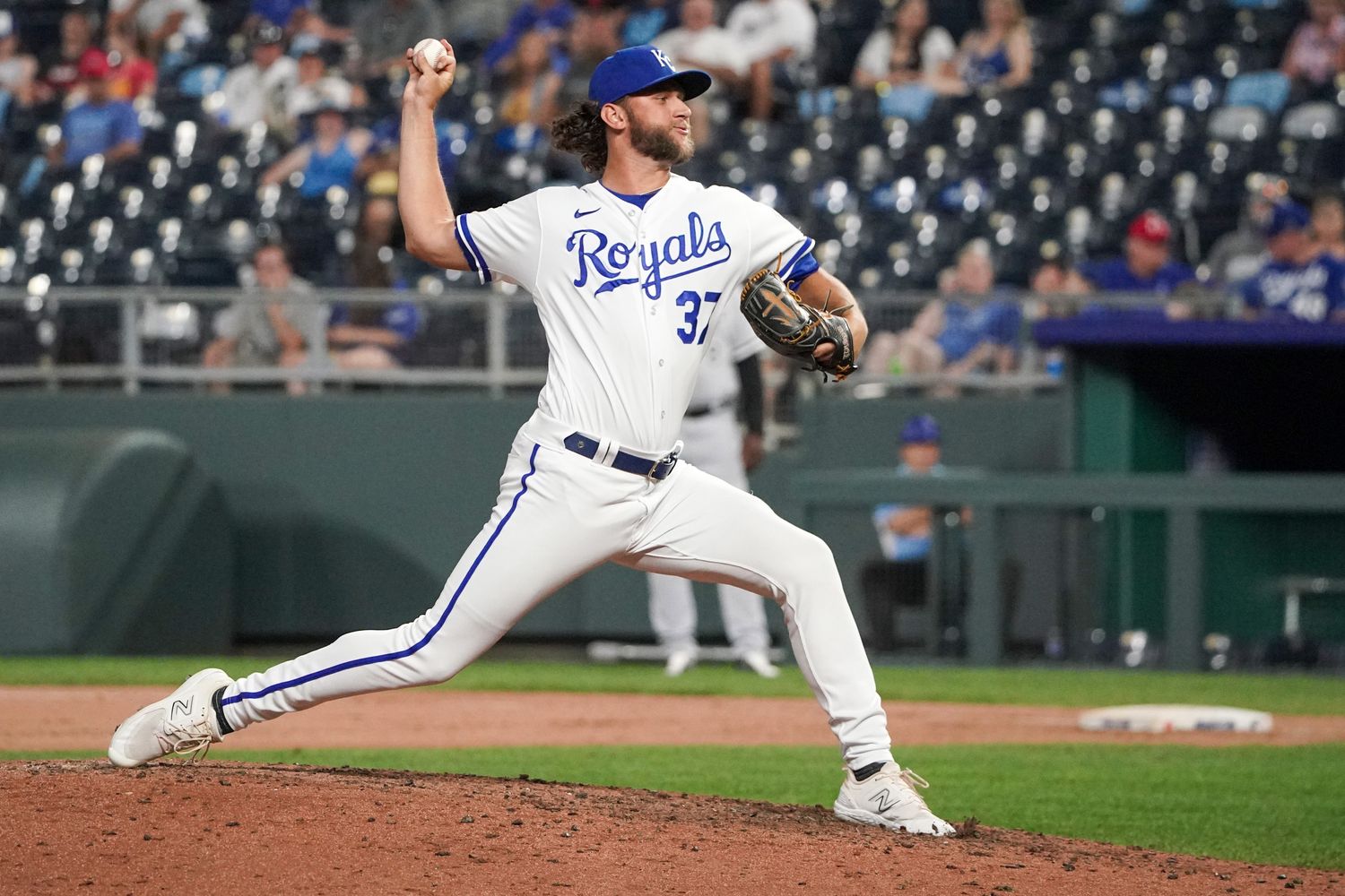 Sep 5, 2023; Kansas City, Missouri, USA; Kansas City Royals relief pitcher Jackson Kowar (37) delivers a pitch against the Chicago White Sox in the ninth inning at Kauffman Stadium.
