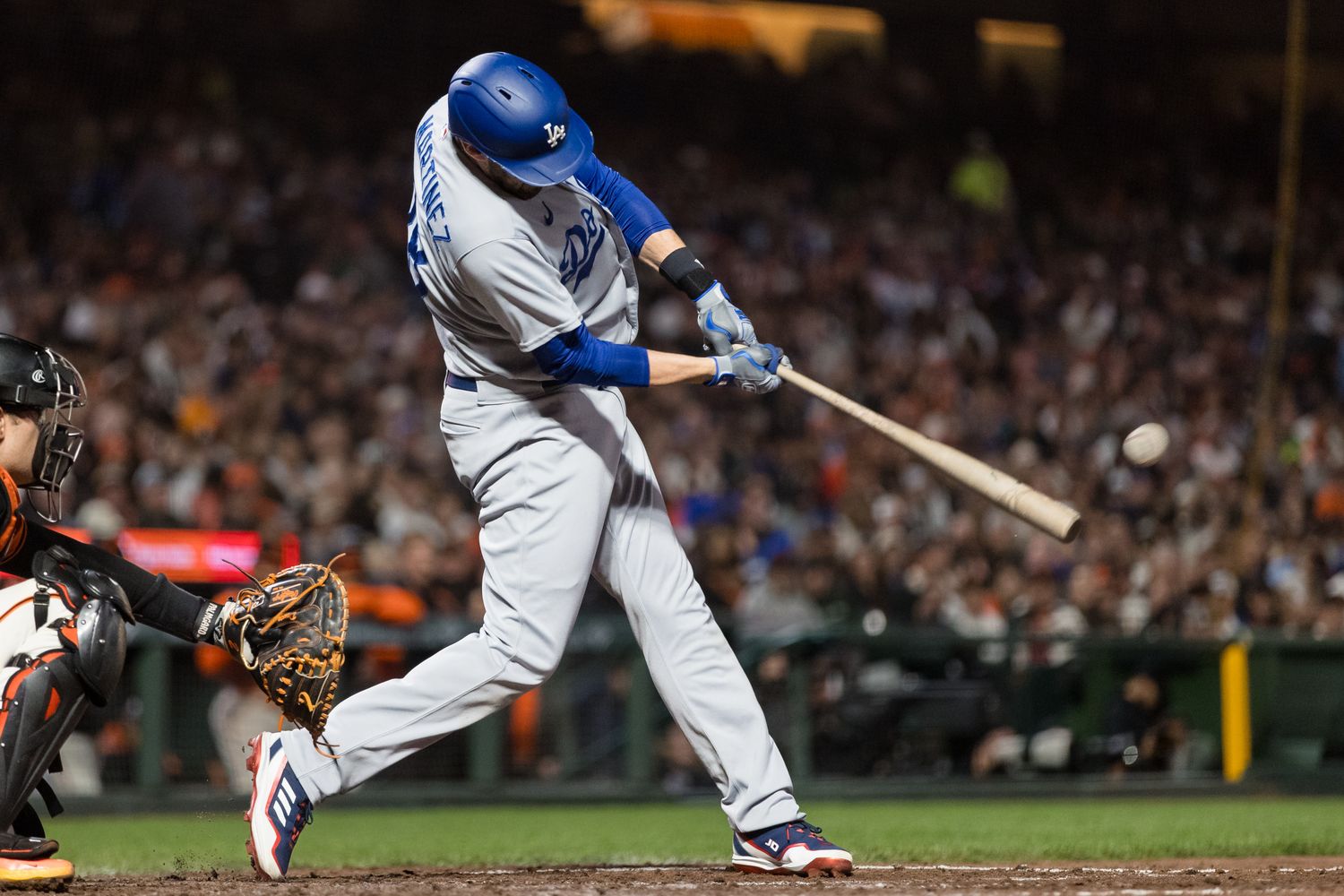 Los Angeles Dodgers designated hitter J.D. Martinez hits a three-run home run against the SF Giants at Oracle Park. (2023)