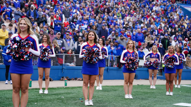Nov 11, 2023; Lawrence, Kansas, USA; The Kansas Jayhawks cheerleaders perform during the second half against the Texas Tech Red Raiders at David Booth Kansas Memorial Stadium. Mandatory Credit: Denny Medley-USA TODAY Sports  
