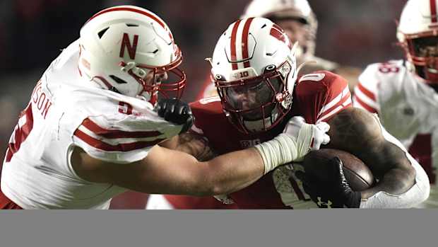 Ty Robinson vs Braelon Allen Q4 Nebraska vs Wisconsin 2023 football USATSI_21932734