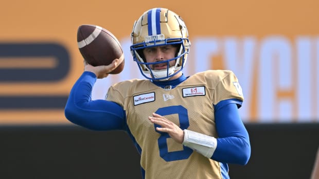 Nov 16, 2023; Hamilton, Ontario, CAN; Winnipeg Blue Bombers quarterback Zach Collaros (8) throws a pass during practice at Tim Hortons Field. Mandatory Credit: Dan Hamilton-USA TODAY Sports