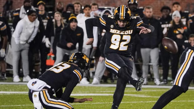 Missouri Tigers place kicker Harrison Mevis (92) kicks the winning field goal against the Florida Gators during the second half at Faurot Field at Memorial Stadium.