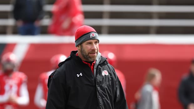 Apr 23, 2022; Salt Lake City, Utah, USA; Utah Utes defensive coordinator Morgan Scalley watches the team warm up prior to the Utah Spring Football Game at Rice Eccles Stadium. Mandatory Credit: Rob Gray-USA TODAY Sports