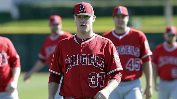 Feb 15, 2017; Tempe, AZ, USA; Los Angeles Angels relief pitcher Andrew Bailey (37) warms up before spring training camp at Tempe Diablo Stadium. Mandatory Credit: Rick Scuteri-USA TODAY Sports  
