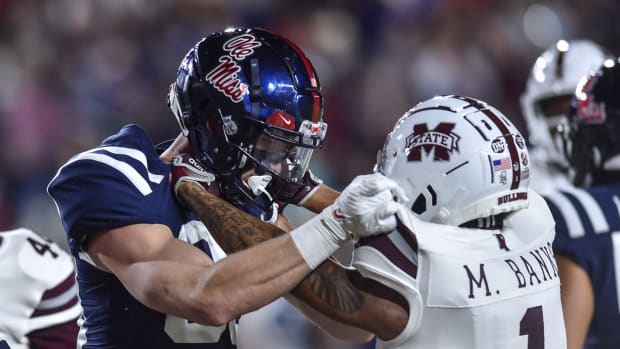 Ole Miss TE Jonathan Hess (80) goes head to head with Mississippi State CB Marcus Banks (1) at the 2022 Egg Bowl at Ole Miss Vaught-Hemingway Stadium in Oxford, Miss., Thursday, Nov. 24, 2022.