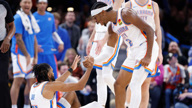 Nov 22, 2023; Oklahoma City, Oklahoma, USA; Oklahoma City Thunder guard Shai Gilgeous-Alexander (2) celebrates with guard Isaiah Joe (11) after scoring a three-point basket and gets the foul during the second half at Paycom Center. Mandatory Credit:
