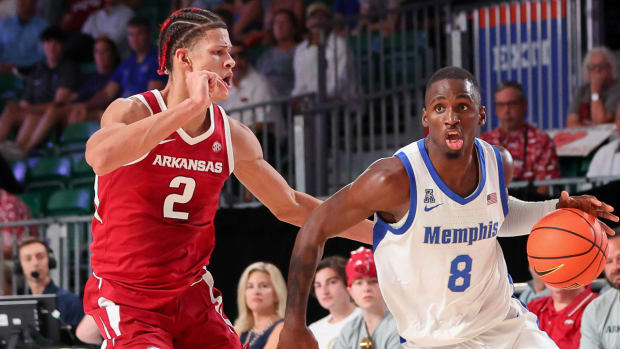 Razorbacks' Trevon Brazile guarding Memphis' David Jones at The Battle 4 Atlantis