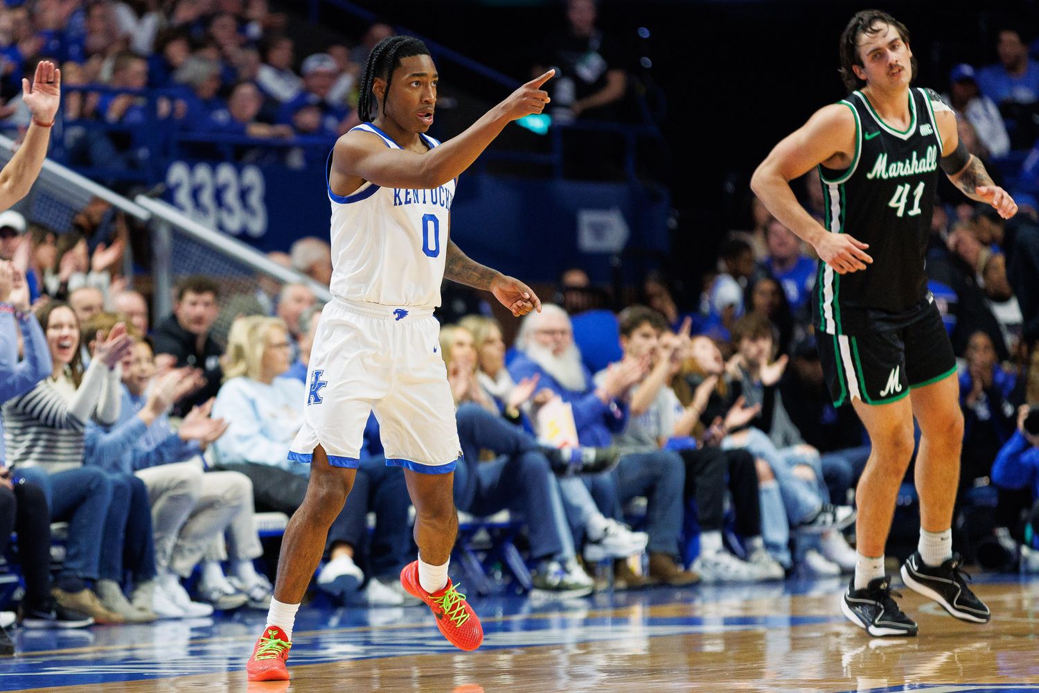 Nov 24, 2023; Lexington, Kentucky, USA; Kentucky Wildcats guard Rob Dillingham (0) celebrates after making a basket during the first half against the Marshall Thundering Herd at Rupp Arena at Central Bank Center. Mandatory Credit: Jordan Prather-USA TODAY Sports