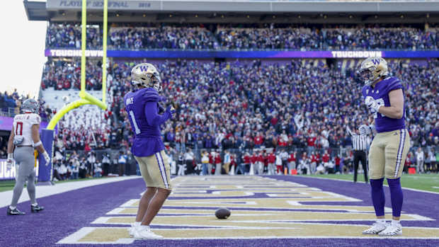 Rome Odunze celebrates his 40-yard TD catch with Jack Westover.