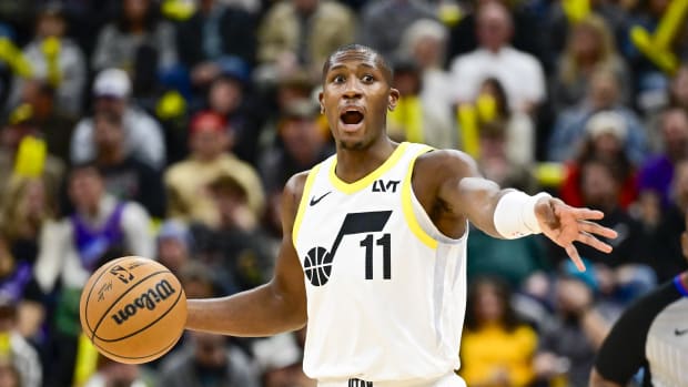 Nov 25, 2023; Salt Lake City, Utah, USA; Utah Jazz guard Kris Dunn (11) calls a play against the New Orleans Pelicans during the first half at Delta Center