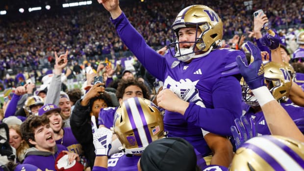 Nov 25, 2023; Seattle, Washington, USA; Washington Huskies place kicker Grady Gross (95) celebrates after making a game-winning field goal against the Washington State Cougars during the fourth quarter at Alaska Airlines Field at Husky Stadium. Mandatory Credit: Joe Nicholson-USA TODAY Sports