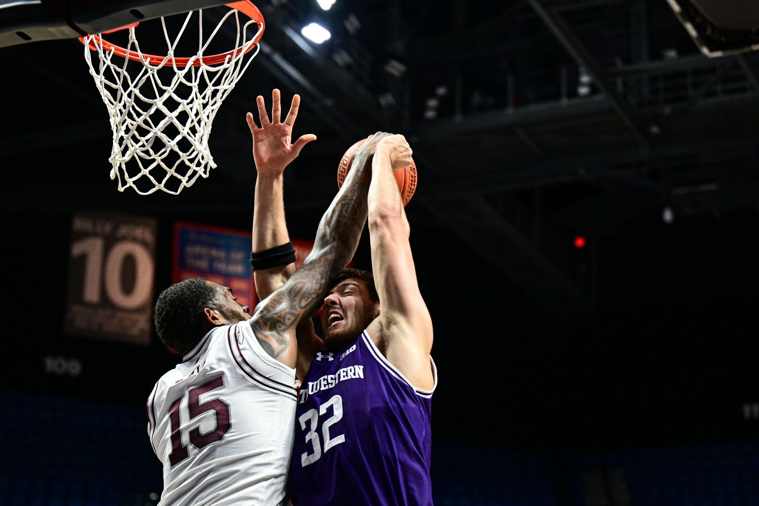 Mississippi State Bulldogs forward Jimmy Bell Jr. (15) blocks a shot by Northwestern Wildcats forward Blake Preston (32) during the first half at Mohegan Sun Arena.