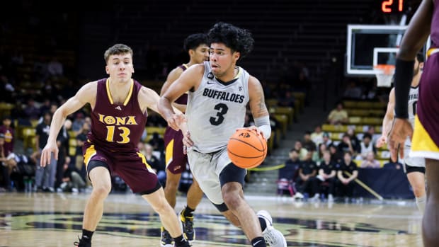 Colorado Buffaloes guard Julian Hammond III (3) drives past Iona Gaels guard Alex Bates IV (13) during the second half at CU Events Center