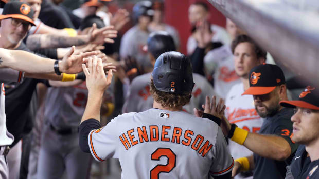 Sep 3, 2023; Phoenix, Arizona, USA; Baltimore Orioles shortstop Gunnar Henderson (2) celebrates scoring a run against the Arizona Diamondbacks the first inning at Chase Field. Mandatory Credit: Joe Camporeale-USA TODAY Sports