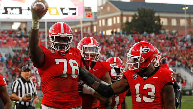 Georgia defensive lineman Nazir Stackhouse (78) celebrates after making an interception during the second half against Missouri in Athens, Ga., on Saturday, Nov. 4, 2023.