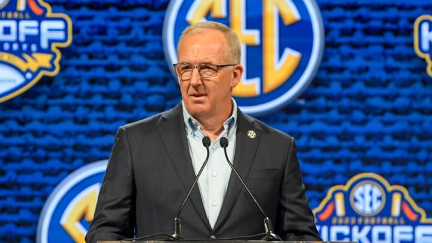 SEC commissioner Greg Sankey talks with the media during SEC Media Days at Grand Hyatt.