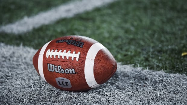 Oct 22, 2021; Montreal, Quebec, CAN; view of a CFL game ball with a french logo on the field before the first quarter during a Canadian Football League game at Molson Stadium. Mandatory Credit: David Kirouac-USA TODAY Sports