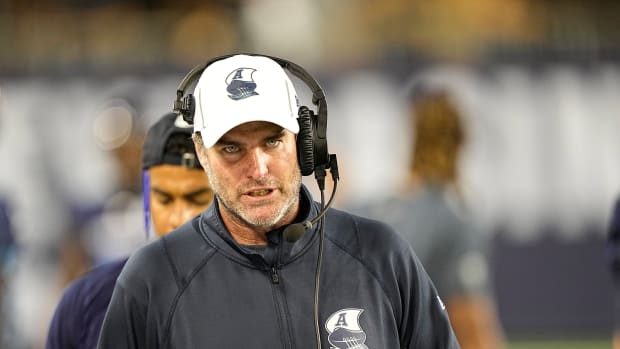 Aug 20, 2022; Toronto, Ontario, CAN; Toronto Argonauts head coach Ryan Dinwiddie talks on his headset during the second half against the Calgary Stampeders at BMO Field. Mandatory Credit: John E. Sokolowski-USA TODAY Sports