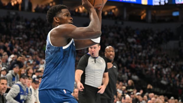 Nov 24, 2023; Minneapolis, Minnesota, USA; Minnesota Timberwolves guard Anthony Edwards (5) shoots the ball against the Sacramento Kings during the third quarter at Target Center.