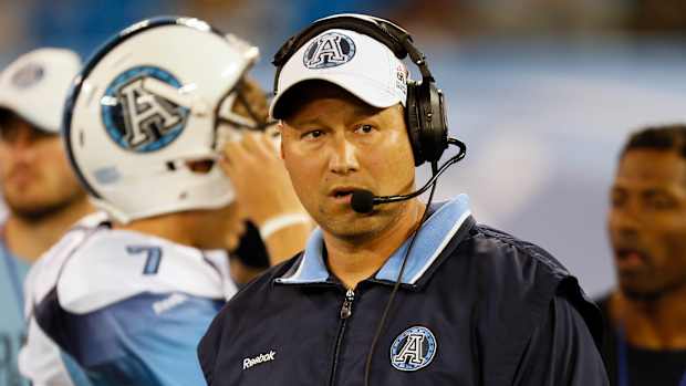 Aug 17, 2014; Toronto, Ontario, Canada; Toronto Argonauts head coach Scott Milanovich on the sidelines against the BC Lions at Rogers Centre. BC defeated Toronto 33-17. Mandatory Credit: John E. Sokolowski-USA TODAY Sports