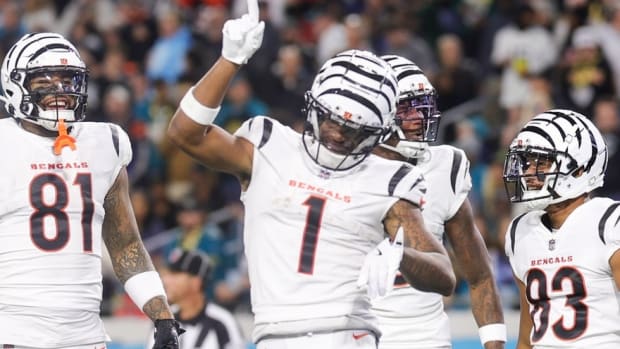 Dec 4, 2023; Jacksonville, Florida, USA; Cincinnati Bengals wide receiver Ja'Marr Chase (1) celebrates after scoring a touchdown against the Jacksonville Jaguars in the third quarter at EverBank Stadium. Mandatory Credit: Nathan Ray Seebeck-USA TODAY Sports  