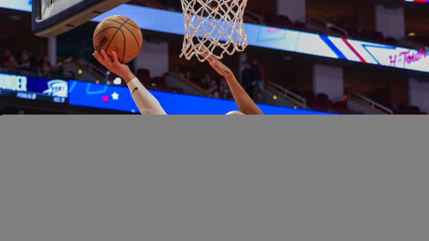 Dec 6, 2023; Houston, Texas, USA; Houston Rockets forward Dillon Brooks (9) makes a basket against Oklahoma City Thunder guard Aaron Wiggins (21) in the second quarter at Toyota Center.