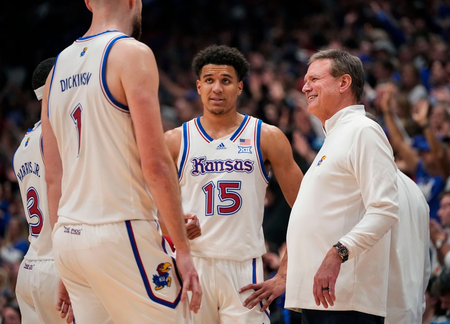 Dec 1, 2023; Lawrence, Kansas, USA; Kansas Jayhawks head coach Bill Self talks with players during a timeout in the second half against the Connecticut Huskies at Allen Fieldhouse.