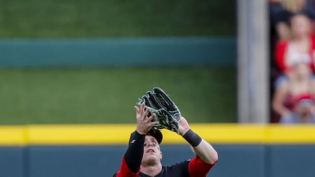 Sep 8, 2023; Cincinnati, Ohio, USA; Cincinnati Reds center fielder Harrison Bader (4) catches a pop up hit by St. Louis Cardinals left fielder Tyler O'Neill (not pictured) in the third inning at Great American Ball Park. Mandatory Credit: Katie Stratman-USA TODAY Sports  