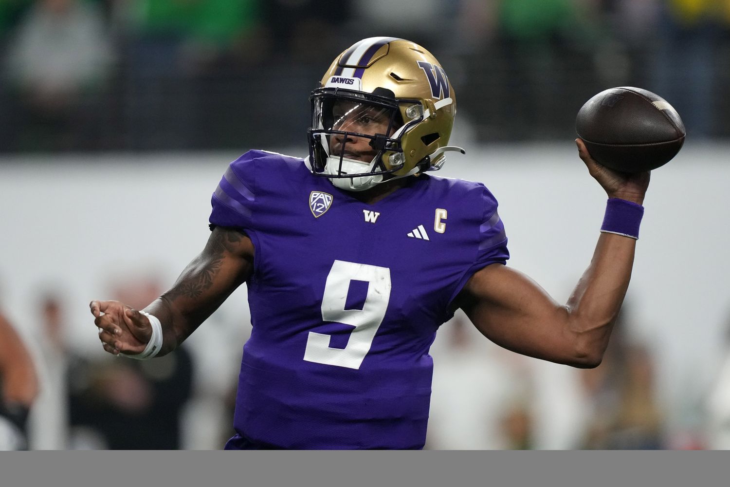 Dec 1, 2023; Las Vegas, NV, USA; Washington Huskies quarterback Michael Penix Jr. (9) throws the ball against the Oregon Ducks in the second half of the Pac-12 Championship game at Allegiant Stadium.