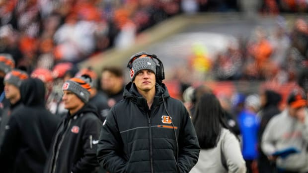 Cincinnati quarterback Joe Burrow looks at the scoreboard as his team faces the Indianapolis Colts and the Cincinnati Bengals, Sunday, December. 10, 2023, at Paycor Stadium in Cincinnati.  , Sunday, December. 10, 2023, at Paycor Stadium in Cincinnati.