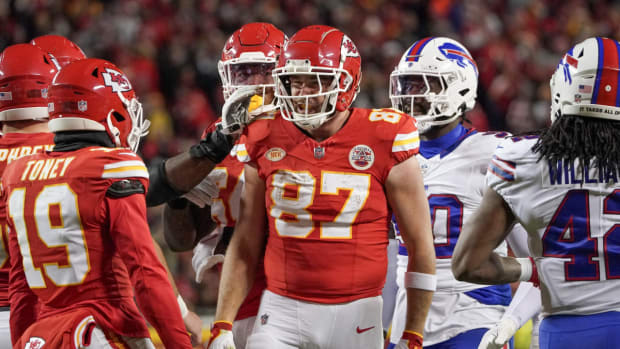 Dec 10, 2023; Kansas City, Missouri, USA; Kansas City Chiefs tight end Travis Kelce (87) celebrates with wide receiver Kadarius Toney (19) after a play against the Buffalo Bills during the second half at GEHA Field at Arrowhead Stadium. Mandatory Credit: Denny Medley-USA TODAY Sports  