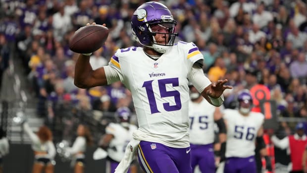 Vikings quarterback Joshua Dobbs (15) throws the ball against the Raiders in the first half at Allegiant Stadium.