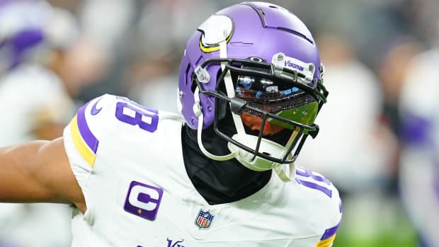 Vikings receiver Justin Jefferson warms up before a game against the Las Vegas Raiders.