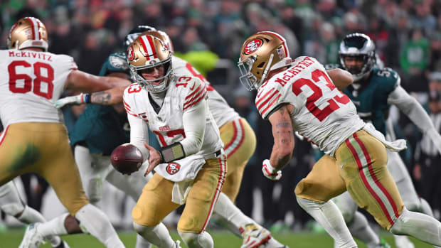 Dec 3, 2023; Philadelphia, Pennsylvania, USA; San Francisco 49ers quarterback Brock Purdy (13) hands the ball to running back Christian McCaffrey (23) against the Philadelphia Eagles at Lincoln Financial Field. Mandatory Credit: Eric Hartline-USA TODAY Sports  