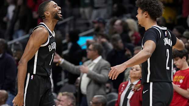 Brooklyn Nets forward Mikal Bridges (1) reacts with forward Cameron Johnson (2) 