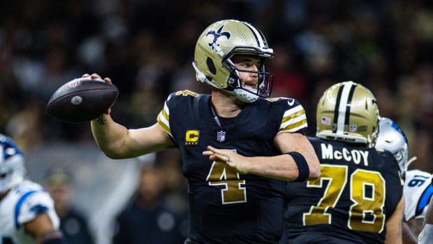 Dec 10, 2023; New Orleans, Louisiana, USA; New Orleans Saints quarterback Derek Carr (4) passes against the Carolina Panthers during the second half at the Caesars Superdome.