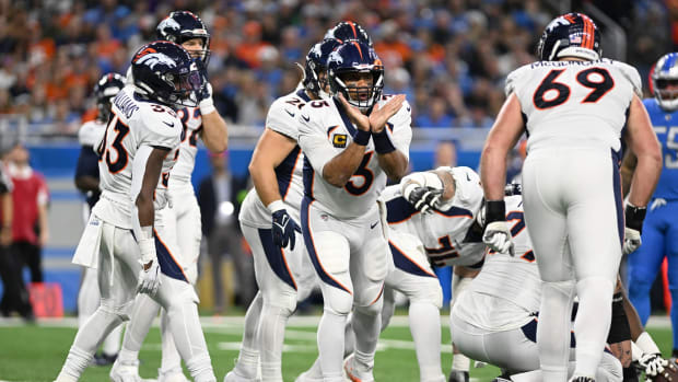 Denver Broncos quarterback Russell Wilson (3) calls an audible at the line of scrimmage against the Detroit Lions in the first quarter at Ford Field.