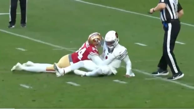 Arizona Cardinals quarterback Kyler Murray is tackled by San Francisco 49ers defensive end Clelin Farrell in a Dec. 17, 2023 game.