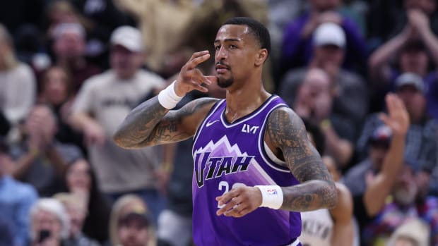 Dec 18, 2023; Salt Lake City, Utah, USA; Utah Jazz forward John Collins (20) reacts after making a three-point shot against the Brooklyn Nets during the fourth quarter at Delta Center.
