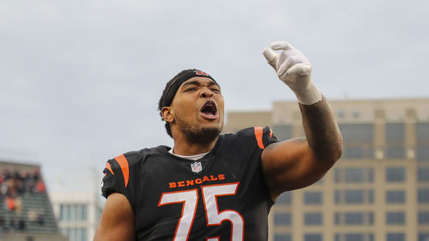 Dec 16, 2023; Cincinnati, Ohio, USA; Cincinnati Bengals offensive tackle Orlando Brown Jr. (75) celebrates after the victory over the Minnesota Vikings at Paycor Stadium. Mandatory Credit: Katie Stratman-USA TODAY Sports  
