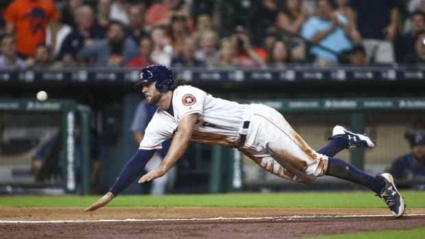 Aug 3, 2017; Houston, TX, USA; Houston Astros center fielder Jake Marisnick (6) slides safely to score a run during the fifth inning against the Tampa Bay Rays at Minute Maid Park. Mandatory Credit: Troy Taormina-USA TODAY Sports  